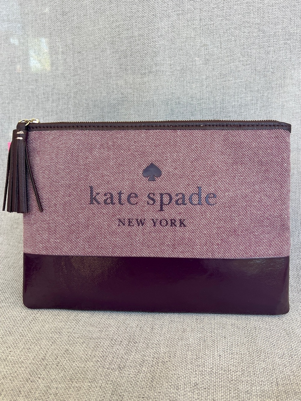 KATE SPADE large tassel pouch clutch plum purple NWT